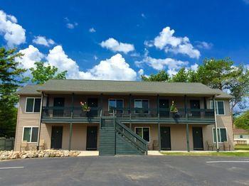 Lucky Horseshoe Cabins Au Sable Bagian luar foto